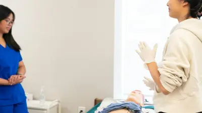 Healthcare students in a hospital hallway during a clinical simulation exercise