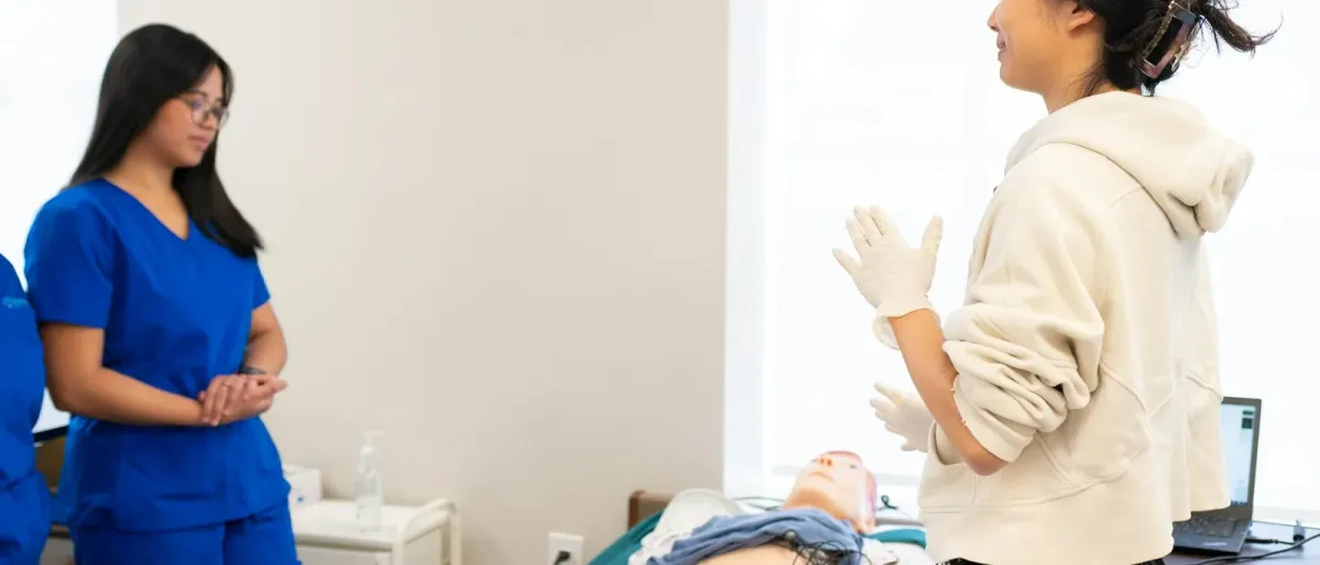 Healthcare students in a hospital hallway during a clinical simulation exercise