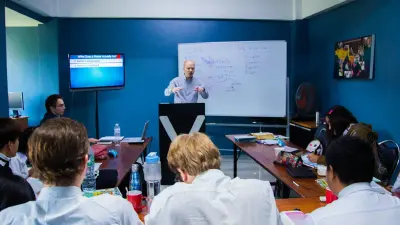 Students receiving hands-on safety and certification training in a classroom workshop